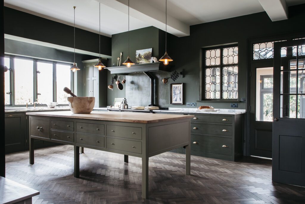 Bespoke kitchen with army green painted cupboards and cabinets